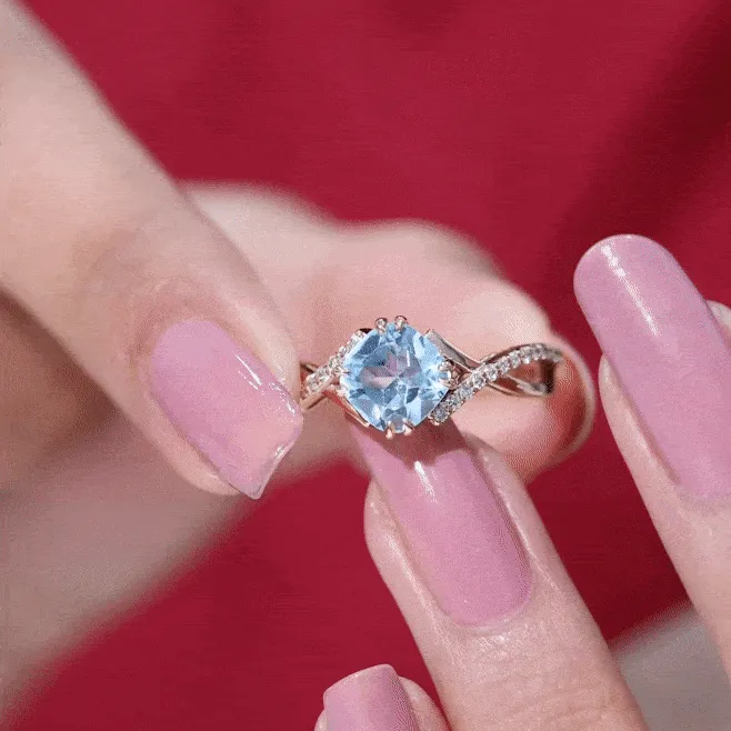 Cushion Cut Sky Blue Topaz Crossover Engagement Ring with Diamond